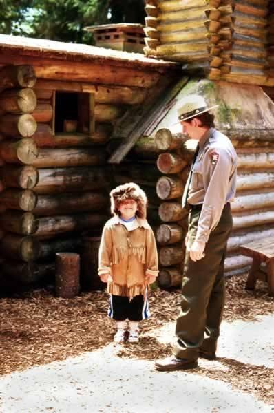 Fort Clatsop ranger with child